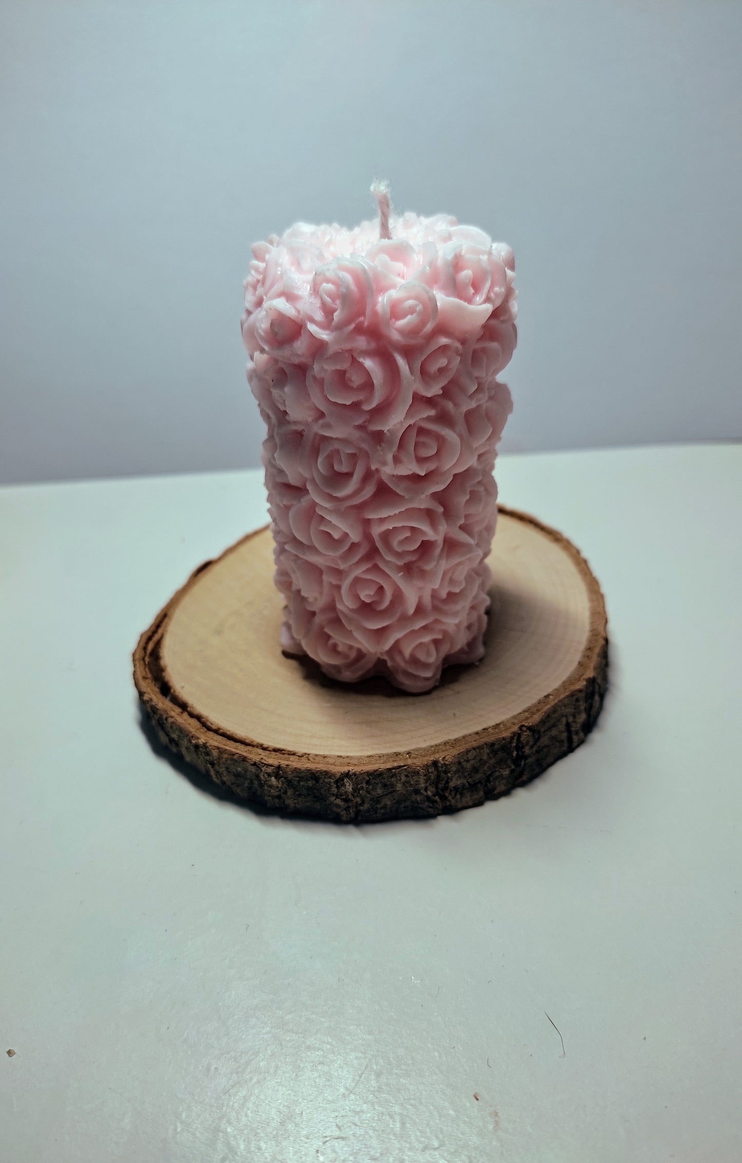 Bougie avec des roses